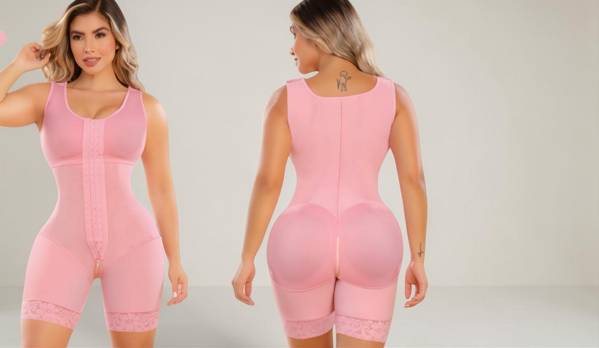 Fajateshapewear.co pink hourglass mid-thigh compression girdle with lace trim and front clasp closure on a model.
